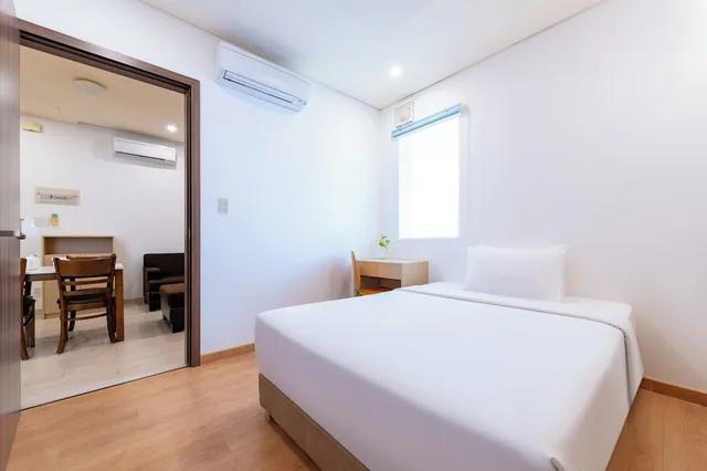 شقة ديلوكس بسرير كوين وسرير مزدوج بإطلالة على المدينة بغرفتي نوم، G8 Center Hotel Saigon 7/10