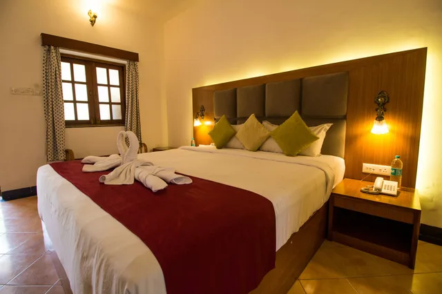 غرفة قياسية بسرير كينج بإطلالة على الحديقة، SHIKARA BEACH RESORT 3/6