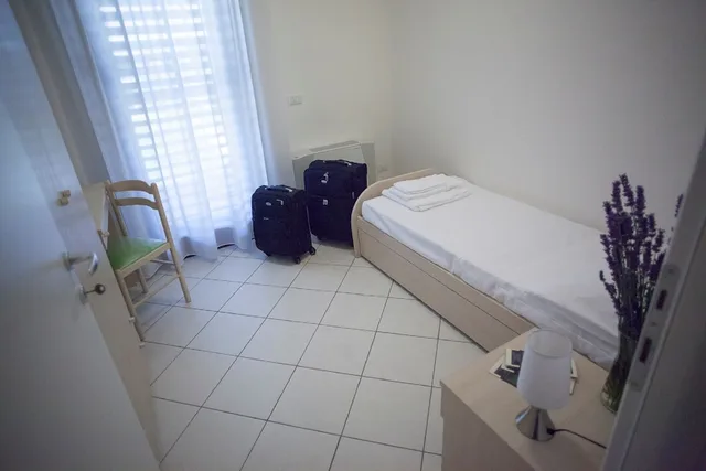 غرفة بسرير مزدوج مع أريكة، Chianti Village Morrocco 4/4