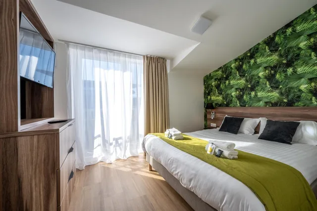 استوديو سوبيريور بسرير كوين، ATHOME RESIDENCE ET SPA 1/2