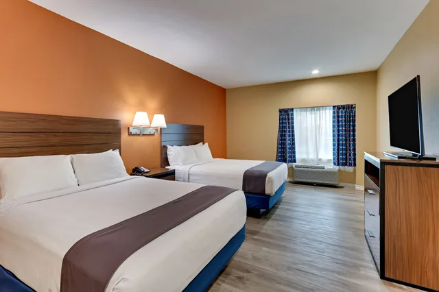 جناح بسريرين كوين مع أريكة لذوي الإعاقة، Captain Apos S Quarters Inn 1/3