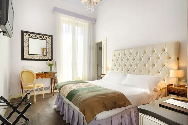 غرفة ديلوكس بسرير كوين، Antica Badia Relais 1/10