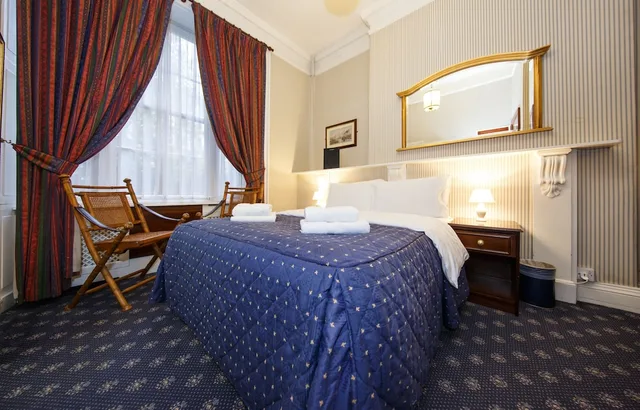 غرفة بسرير مزدوج، Regency House 3/8