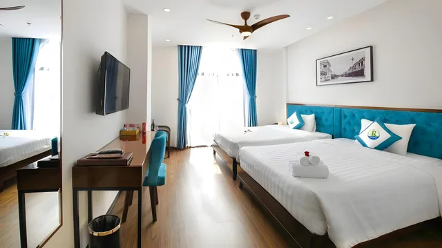غرفة ديلوكس بسريرين مزدوجين بشرفة، Ritzy Boutique Hotel Da Nang 1/1