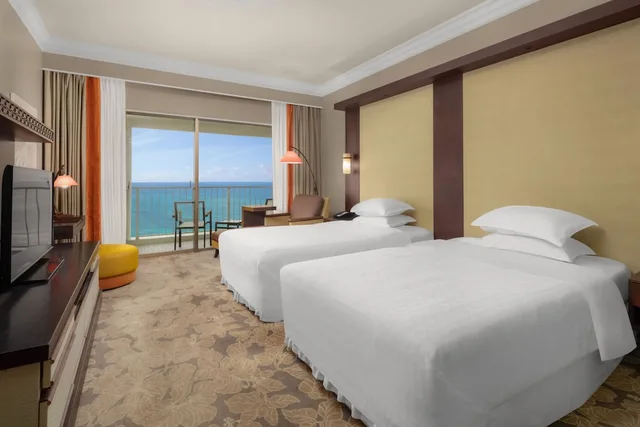 غرفة بسريرين منفصلين بإطلالة على البحر، RIHGA Royal Laguna Guam Resort 4/5