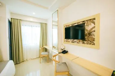 غرفة ديلوكس ثلاثية بسرير مزدوج وسرير فردي، Panglao Vista Suites by SMS Hospitality 1/1