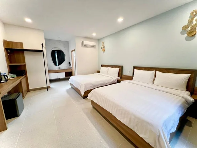 غرفة بسريرين منفصلين بإطلالة على المسبح، Sandy Clay Bungalows 2/3