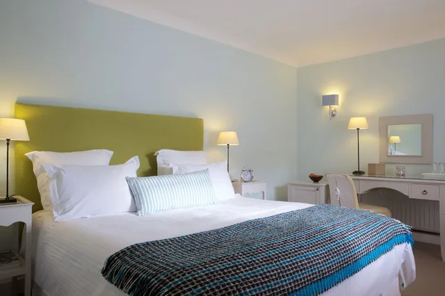 غرفة ديلوكس بسرير كينج بشرفة، The Lugger Hotel 2/9