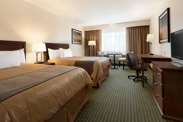 Room, 2 Queen Beds, Exterior Entrance, Smoking، Travelodge Hotel by Wyndham Weyburn 1/3