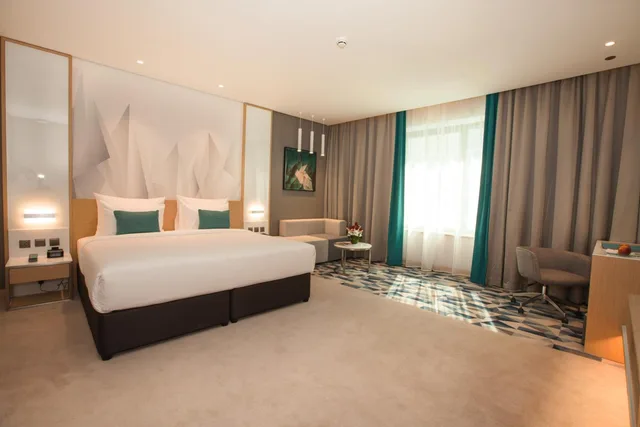غرفة بريميوم بسرير كينج، Flora Inn Dubai 4/6