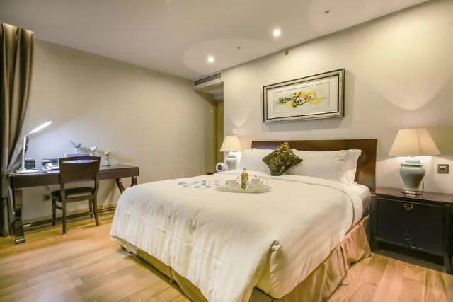 Two Bedroom Deluxe (1King+1Single), Green Court Residence Jinqiao Diamond Shanghai 2/3
