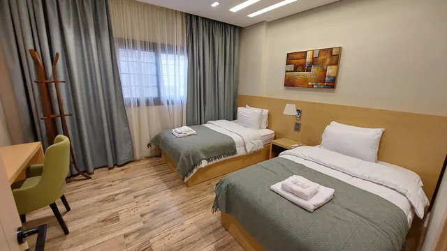 Two Bedroom Apartment with City View، Mirage Taiaa Hotel Apartments 1/4