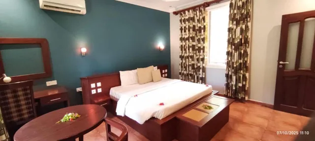 غرفة بسرير كينج بإطلالة على المسبح، Sunrise Beach Resort 4/10