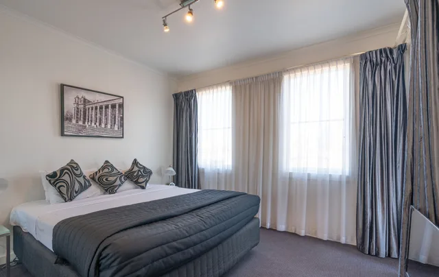 غرفة تنفيذية بسرير كينج بغرفة نوم واحدة، Carlton Clocktower Apartments 1/6
