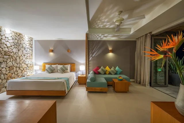 غرفة بسرير كينج وسرير كوين بإطلالة على الحديقة بغرفة نوم واحدة، Mia Resort Nha Trang 4/10