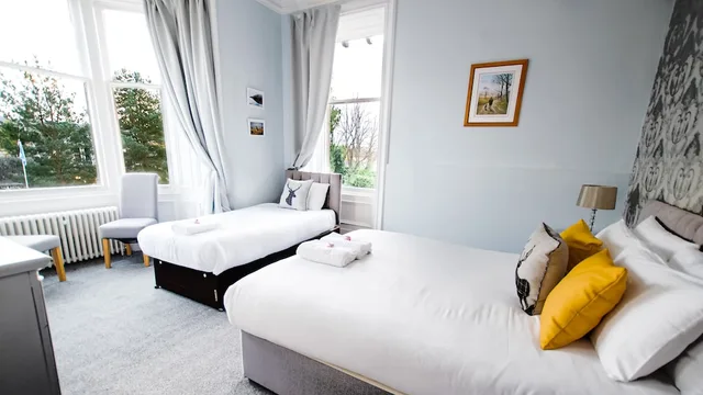 غرفة عائلية ثلاثية بثلاثة أسرّة بغرفة نوم واحدة، Mcinnes House Hotel 1/4