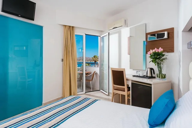 غرفة بسريرين منفصلين بإطلالة على الحديقة، Elounda Akti Olous Hotel - Adults Only 2/4