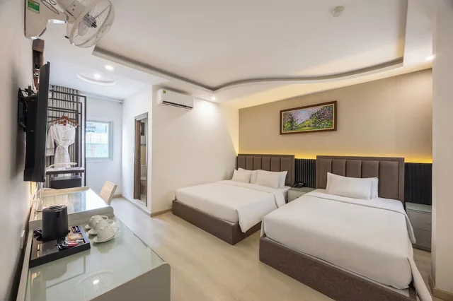 غرفة عائلية ثلاثية بسرير كوين وسرير فردي، A25 Hotel - 65G Nguyen Thai Hoc 6/10