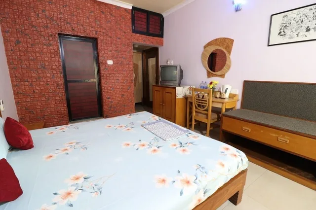 غرفة ديلوكس بسرير كينج بشرفة، Mama Mids Home 9/10