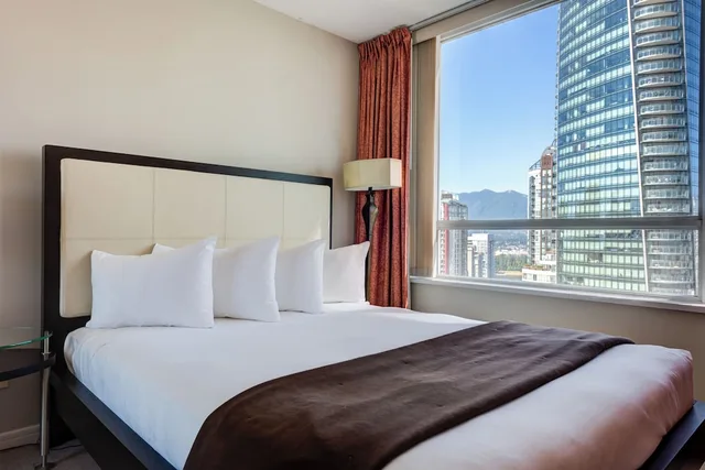 1 Bedroom, Carmana, Suite, Queen Bed, Carmana Hotel and Suites 1/2