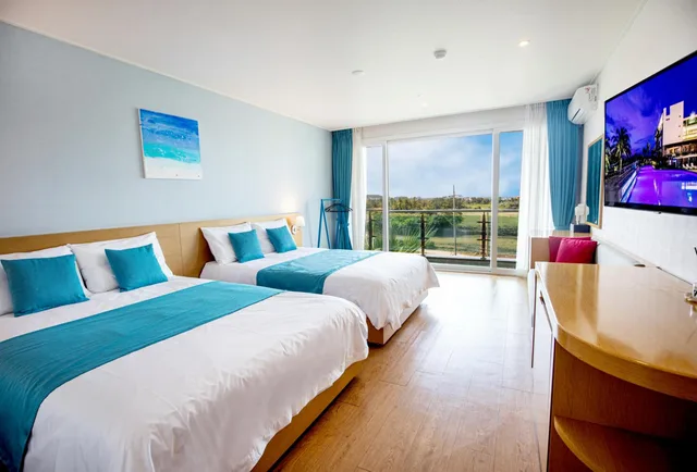 غرفة سوبيريور بسريرين منفصلين بإطلالة على الحديقة، The Four Graces Resort 5/7