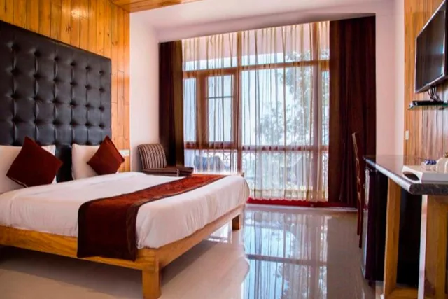 غرفة ديلوكس بسرير كينج، Blue Pine Resort 1/1