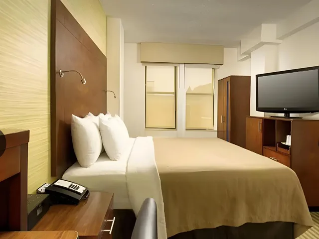 Efficiency, Suite, 1 King and 2 Queen Beds، Suburban Studios Newport News - Hampton 3/6