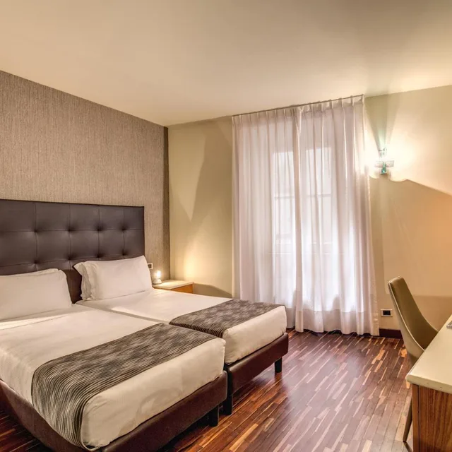 غرفة بسرير مزدوج أو سريرين منفصلين، Albergo Firenze 3/10