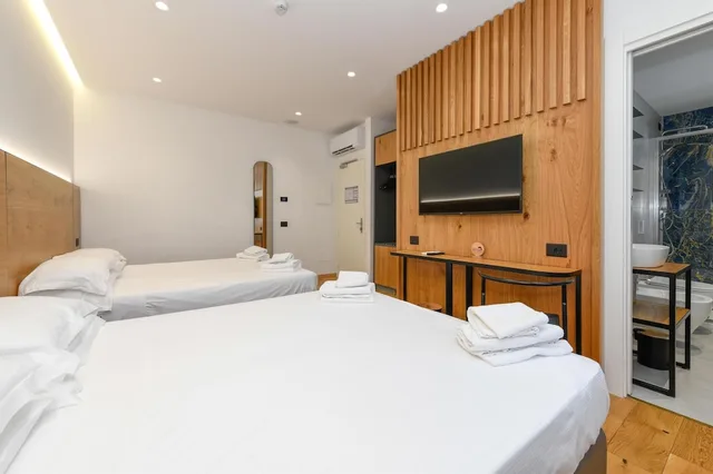 غرفة كومفورت رباعية بسريرين كوين، Best Western Hotel Arya 2/10
