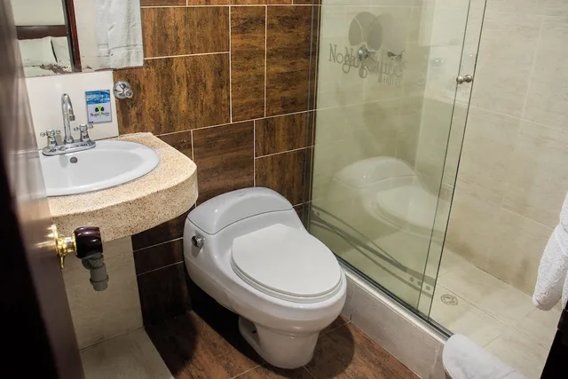 Room, 2 Queen Beds, Nogal Suite Hotel Pasto 7/8