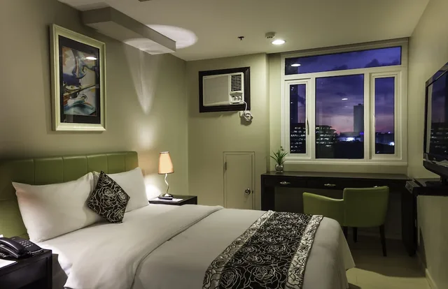غرفة كلاسيكية ديلوكس بسرير كوين، The Exchange Regency Residence Hotel 2/5