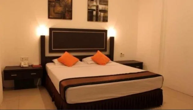 غرفة ديلوكس بسرير مزدوج، Grand Global Hotel Palangka Raya 3/4