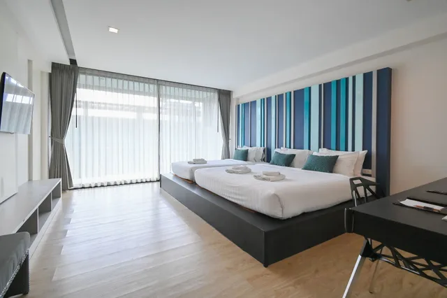 غرفة ديلوكس ثلاثية بسرير مزدوج وسرير فردي بشرفة بغرفة نوم واحدة، Att Boutique Hotel 1/10