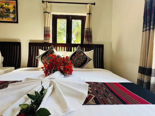 غرفة ديلوكس ثلاثية بسرير كينج وسرير فردي، Thatsaphone Hotel 7/9