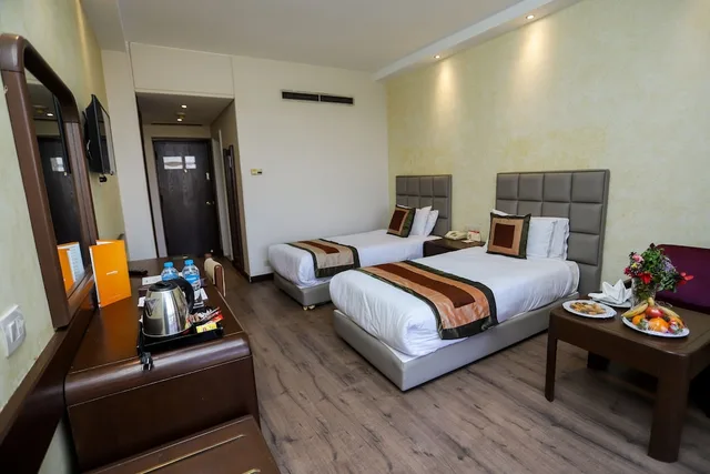 غرفة قياسية ثلاثية بسريرين منفصلين بإطلالة على الحديقة مع أريكة، Pyramisa Island Hotel Aswan 7/10