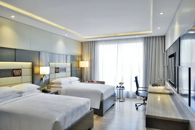 غرفة بسريرين مزدوجين بإطلالة على المسبح، Jw Marriott Hotel Mumbai Sahar 2/9