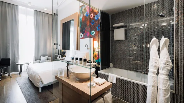 غرفة ديلوكس بسرير كينج بإطلالة على الحديقة، Hotel Metropole Geneve 7/8