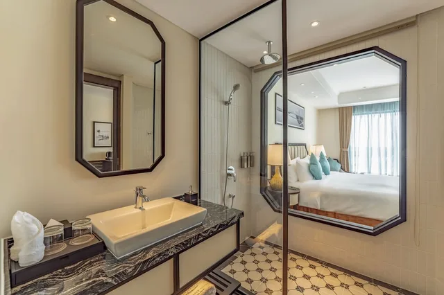 غرفة ديلوكس بسريرين منفصلين بإطلالة على المدينة، Charmant Suites a Boutique Hotel Can Tho 3/4