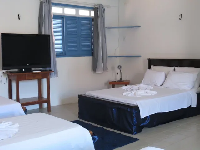 جناح ديلوكس رباعي بسريرين منفصلين، La Suite Praia 4/9