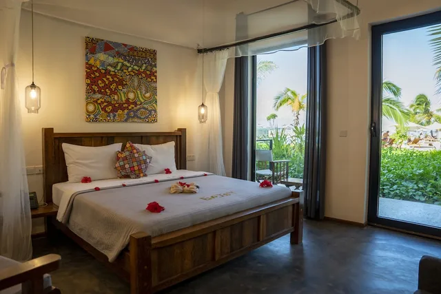 غرفة ديلوكس ثلاثية بسرير كينج، The One Resort Zanzibar 1/2