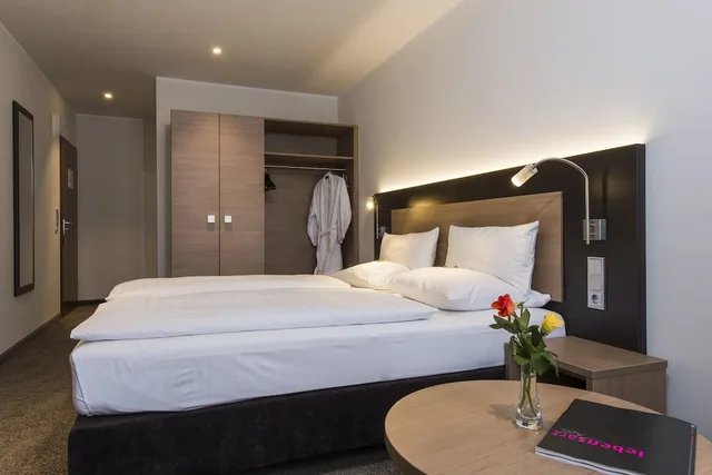 غرفة كومفورت بسرير كوين، Astor And Aparthotel 3/6