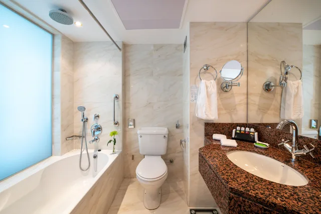 غرفة كلاسيكية بسريرين منفصلين بإطلالة جزئية على البحر، Constantinou Bros Athena Beach Hotel 4/6