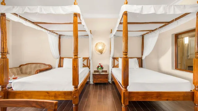 غرفة بسريرين منفصلين بإطلالة على المسبح، TOP Domina Coral Bay Resort 1/2