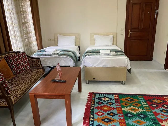 غرفة عائلية بسرير كوين وسريرين فرديين، Atam Suites Apart 6/10