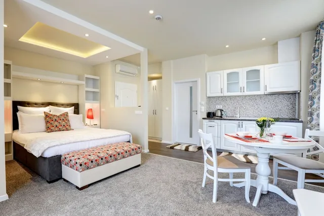 جناح جونيور ركني بسرير كوين بمطبخ صغير، City Boutique Inn 1/5