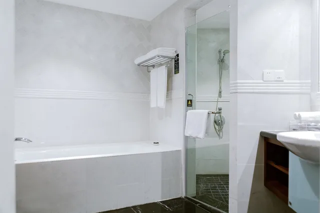 غرفة ديلوكس بسرير كينج، Pullman Shanghai Central 5/6