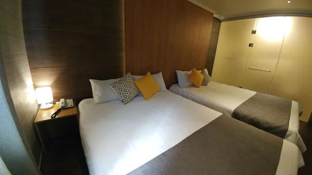 غرفة قياسية رباعية بسريرين مزدوجين، HOTEL TONG YEONDONG JEJU 1/7