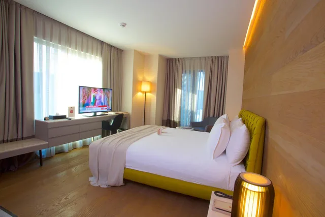 غرفة تنفيذية بسرير كوين، Dosso Dossi Hotels and SPA Downtown 1/7