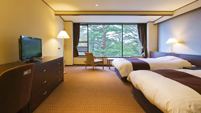 غرفة بسريرين منفصلين بإطلالة على الجبل في المبنى الرئيسي، Jodogahama Park Hotel 1/1