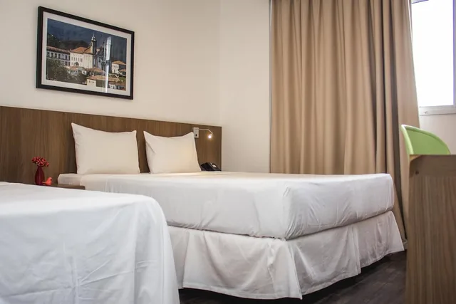 غرفة سوبيريور بسريرين منفصلين وسريرين فرديين، Itapoa Executive Hotel 2/4